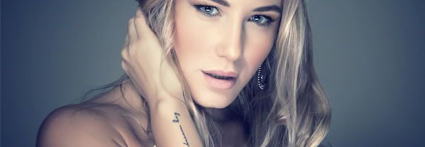 Q Music radio actie! Patricia van Liemt laat tattoo verwijderen